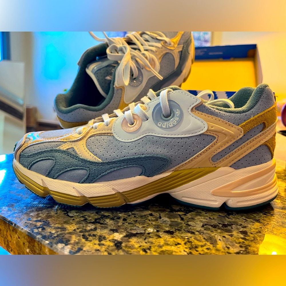 brand new adidas astir sneakers